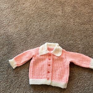 Hand Made Baby Girl Knitted Pink White Sweater Buttons (Handmade)

Size 6 Months
